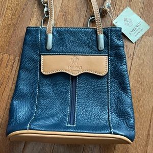 I Medici blue and tan Italian leather versatile backpack or cross body bag.